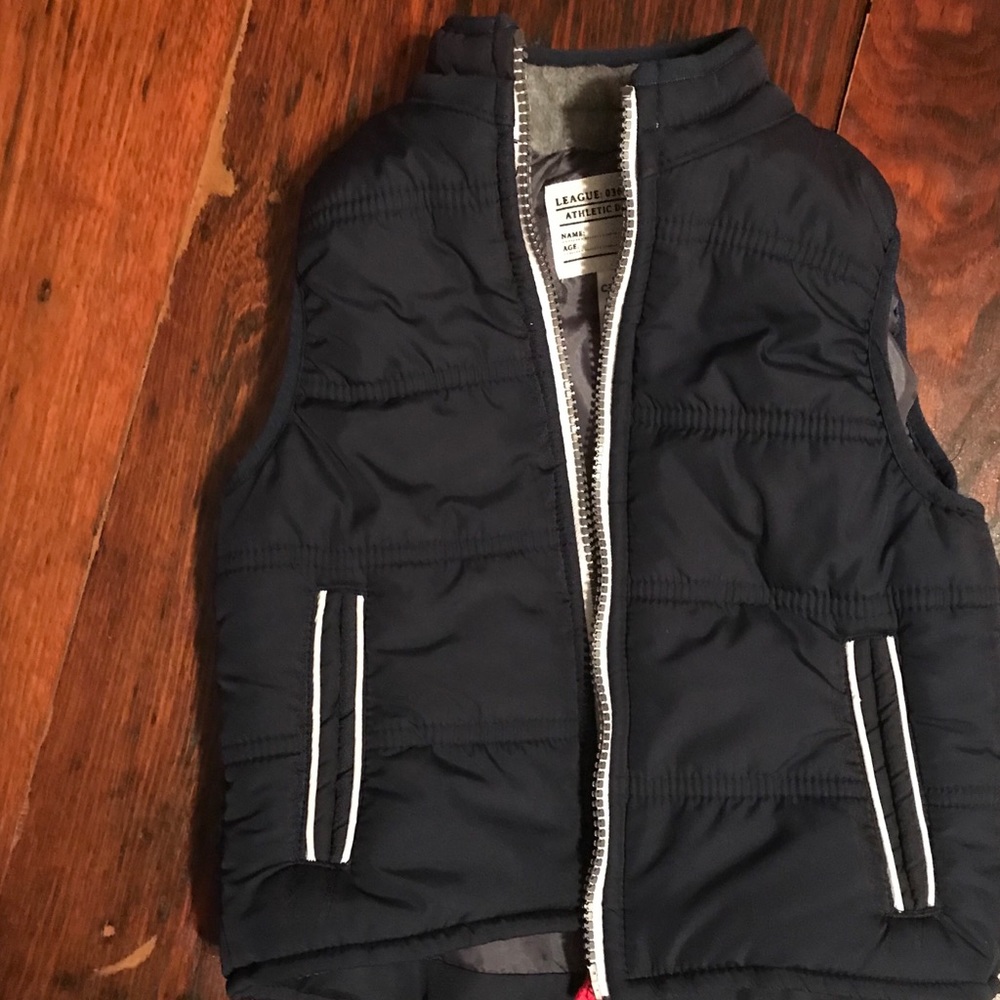 Two toddler vests